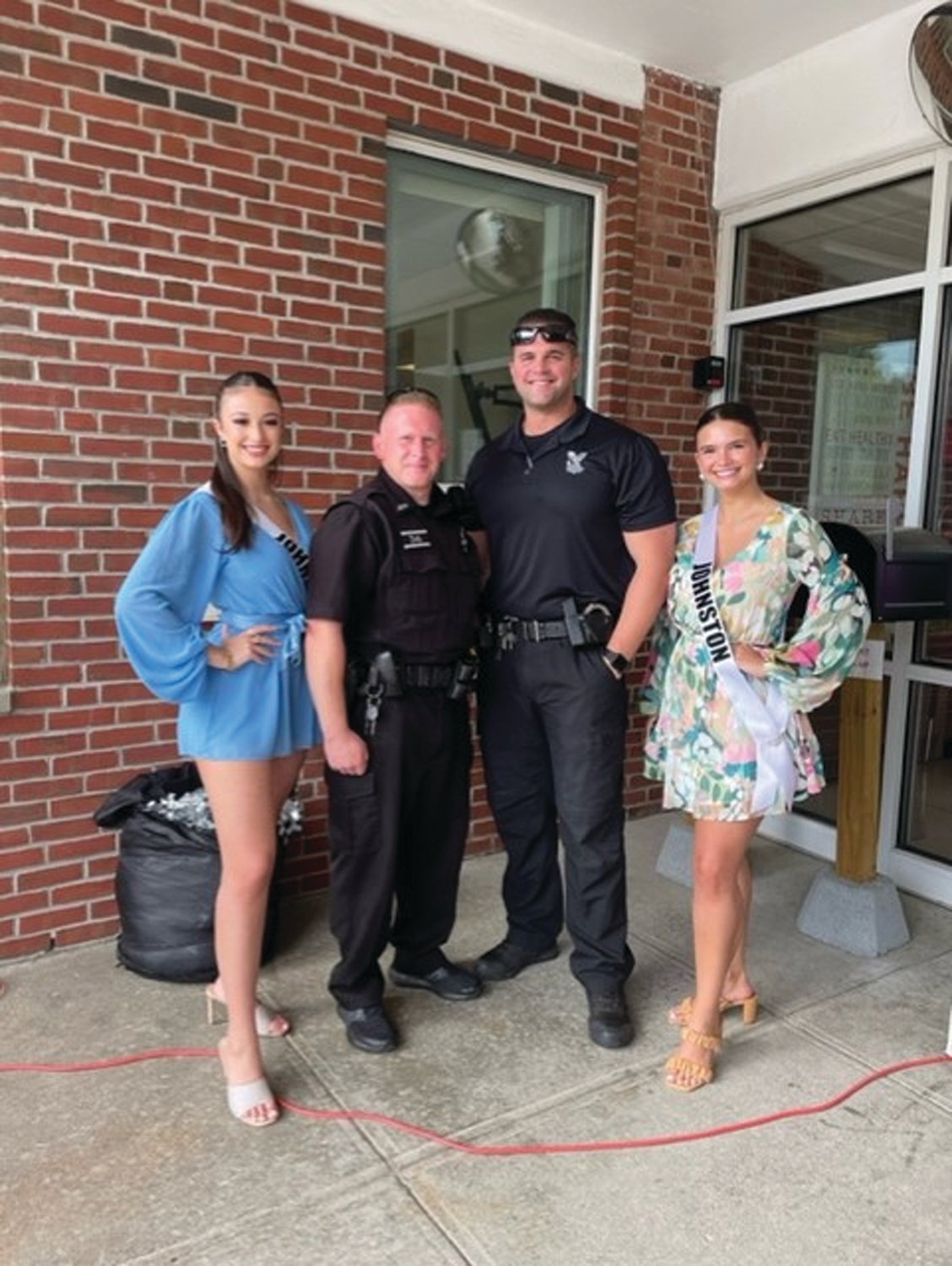 GRAND GUESTS: Among those people who helped make the last day of school at Winsor Hill Elementary extra special were Miss Teen Johnston Giavanna Arakelian, Johnston Police Officers Matt Leveillee and Lou Cotoia and Miss Johnston Nina Benedetto.